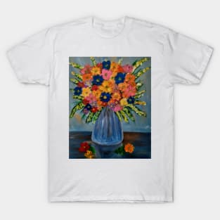 Stunning bouquet of mixed flowers in a glass and gold vase . T-Shirt